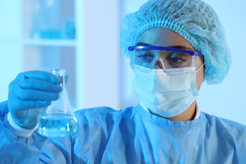 Wall Mural - Scientist working with sample in laboratory. Medical research