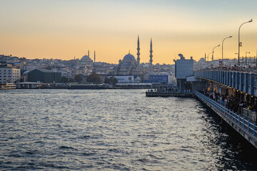Wall Mural - Bosphorus, the Strait of Istanbul, cruise and ferry view with Galata bridge at sunset. Istanbul cityscape with the famous landmark of Galata bridge seen from Bosphorus.	
