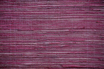 Wall Mural - Detail of burgundy woven fabric as background or texture