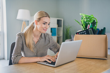 Photo of optimistic lady manager ceo bankrupt company need job use netbook chat hr recruiters sit desk modern workspace