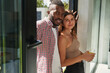 © Viacheslav Yakobchuk - Happy romantic mixed-race couple standing in doorway