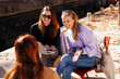 © Westend61 - Smiling businesswoman gesturing in business meeting on sunny day