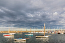Australia, Victoria, Melbourne, Cloudy Sky Over Yachts Floating In Royal Melbourne Yacht Squadron Marina