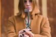 © Westend61 - Young woman holding old key