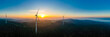© Westend61 - Aerial panorama of wind farm in forested Schurwald range at sunset