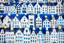 Famous Souvenir - Traditional Blue Porcelain Houses Background. European Vintage Dutch Houses In Souvenir Shop Background.