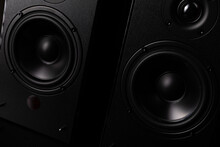 Black Speaker System With Piano Lacquer And Huge Speakers On A Black Background