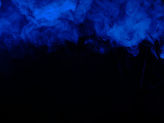 Leinwandbilder - Blue smoke on black background