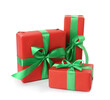 © New Africa - Red gift boxes with green bows on white background