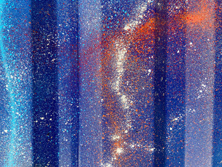 artistic blue colourful ink paint drips detail on metallic textured background of industrial artists