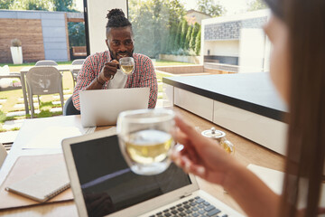 Wall Mural - Man enjoying tea break with his female colleague