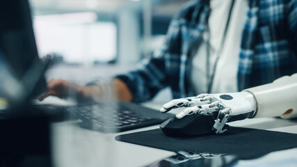 Wall Mural - Diverse Body Positive Office: Woman with Disability Using Prosthetic Arm to Work on Computer. Professional with Futuristic Thought Controlled Myoelectric Bionic Hand.