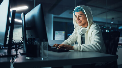 Poster - Late at Night in Office: Portrait of Young Stylish Freelancer Woman Working on Desktop Computer. Blue Haired Person Creating Modern Content, Do Project Design, Create Colorful Marketing and Smile