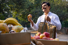 Family Man Shopping Apple In Fruits Market