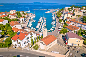 Wall Mural - Town of Malinska center and Riva aerial view, Island of Krk