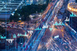 © VideoFlow - FOREX graph hologram over night busy road traffic in Bangkok, the developed location for stock market researchers in Southeast Asia. The concept of fundamental analysis. Double exposure.