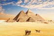 The Great Pyramids of Egypt and traditional desert carriages, Cairo, Giza