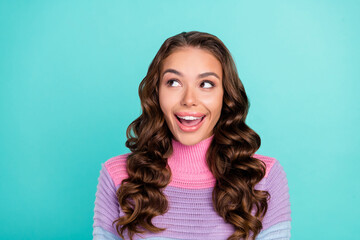 Wall Mural - Photo of hooray brunette young lady look empty space wear striped sweater isolated on teal color background