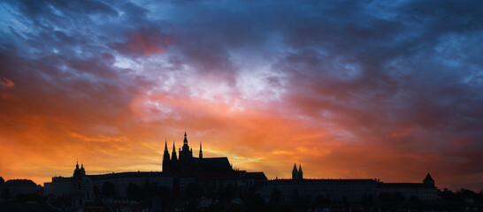 Poster - Beautiful sunset sky with the silhouette of an ancient castle, twilight sky background.