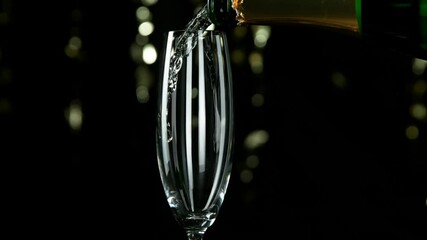 Wall Mural - Super slow motion of pouring champagne wine with camera motion. Filmed on high speed cinema camera, 1000fps.