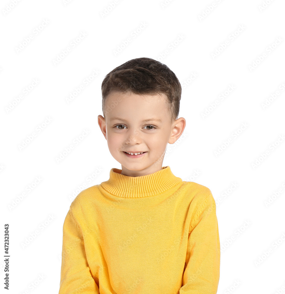 Portrait of smiling little boy on white background