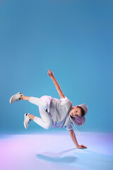 Poster - Dancing little boy on color background