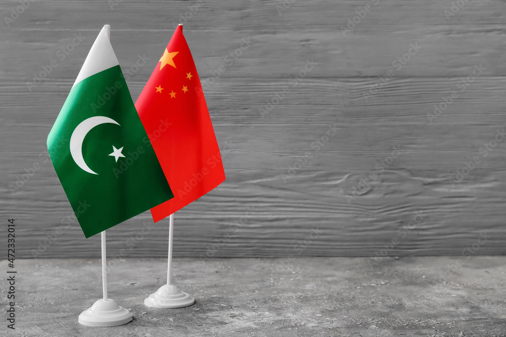 Flags of China and Pakistan on table