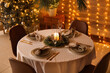 © Pixel-Shot - Dining table with beautiful setting for Christmas celebration in festive room