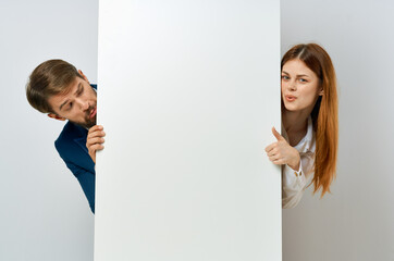 Wall Mural - business man and woman billboard marketing fun emotions copy-space studio