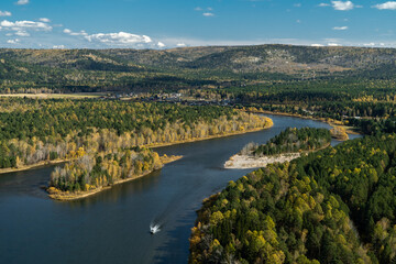 Wall Mural - The boat is sailing along the Irkut river