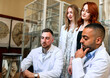 © andrey_orlov - Group medicine students looks at an anatomical specimen in the university classroom.