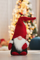 Sticker - Cute Christmas gnome on floor in decorated room