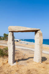 Wall Mural - An old three-stone arch on a beach in turkey as a local landmark with a beautiful landscape