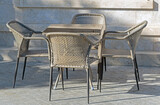 Fototapeta Kuchnia - chairs and tables in the summer cafe