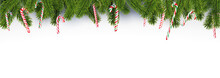 Hanging Christmas White, Red, Green Candy Canes Frame With Fir Branch.
