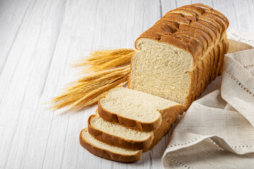 Sliced bread loaf on the table.