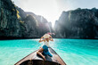 Beautiful woman making an excursion to phi phi island and maya beach in Thailand
