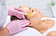 © Dimid - Cosmetologist does prp therapy of a beautiful woman in a beauty salon. Cosmetology concept.