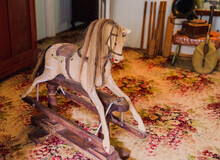 Old Rocking Horse In Bedroom Of Historic Home