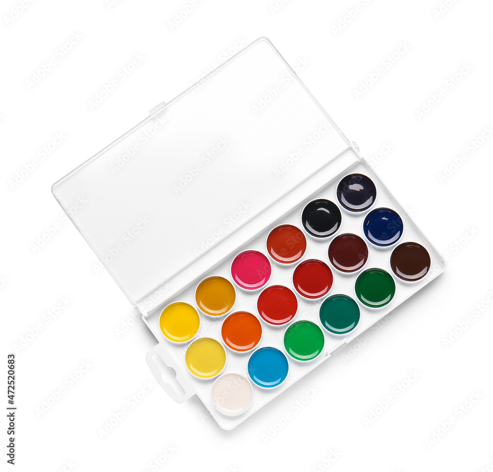 Plastic box with watercolor paints on white background