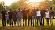 © Rawpixel.com - Group of people support unity arm around together