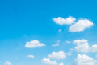 white fluffys clouds sky background with blue sky background for copyspace