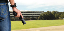 9mm Automatic Pistol Holding In Right Hand Of Shooter, Concept For Security, Robbery, Gangster, Bodyguard Around The World. Selective Focus On Pistol.