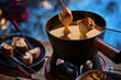 Tasty croutons in cheese fondue