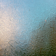 Frost On The Windshield, The Rays Of The Morning Sun Melt The Frost Formed Overnight. Background, Texture.