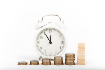 Wall Mural - growing pile of money and alarm clock. economy and tax concept. isolated white background.