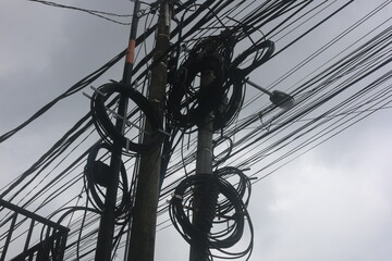 a collection of cables that are installed in large quantities so that it looks messy