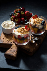 Wall Mural - fresh fruit with custard in glasses, vertical