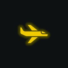 Wall Mural - Airplane yellow glowing neon icon