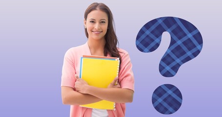 Portrait of smiling young female student holding books by checked pattern question mark